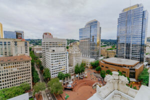The downtown Portland skyline at dusk seen from Departure Rooftop Bar