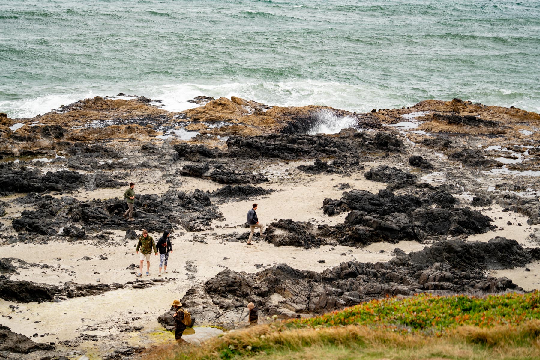 Dark volcanic tide pool rocks and pools at Cape Perpetua on the Oregon coast